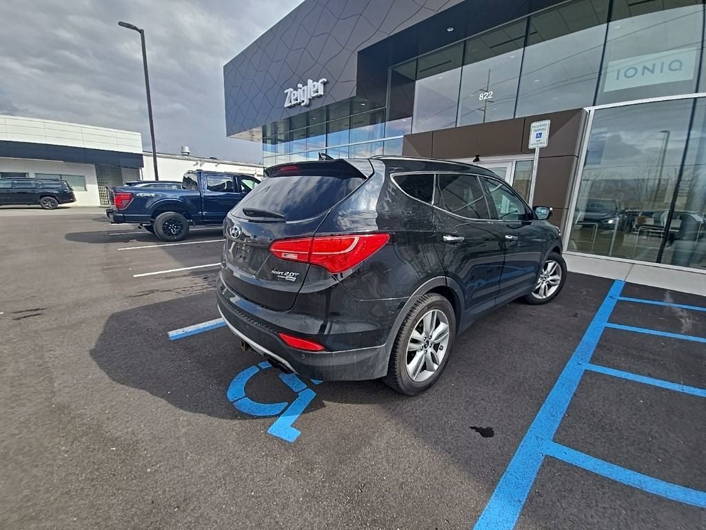 Used 2015 Hyundai Santa Fe Sport 2.0T with VIN 5XYZWDLA5FG242934 for sale in Holland, MI